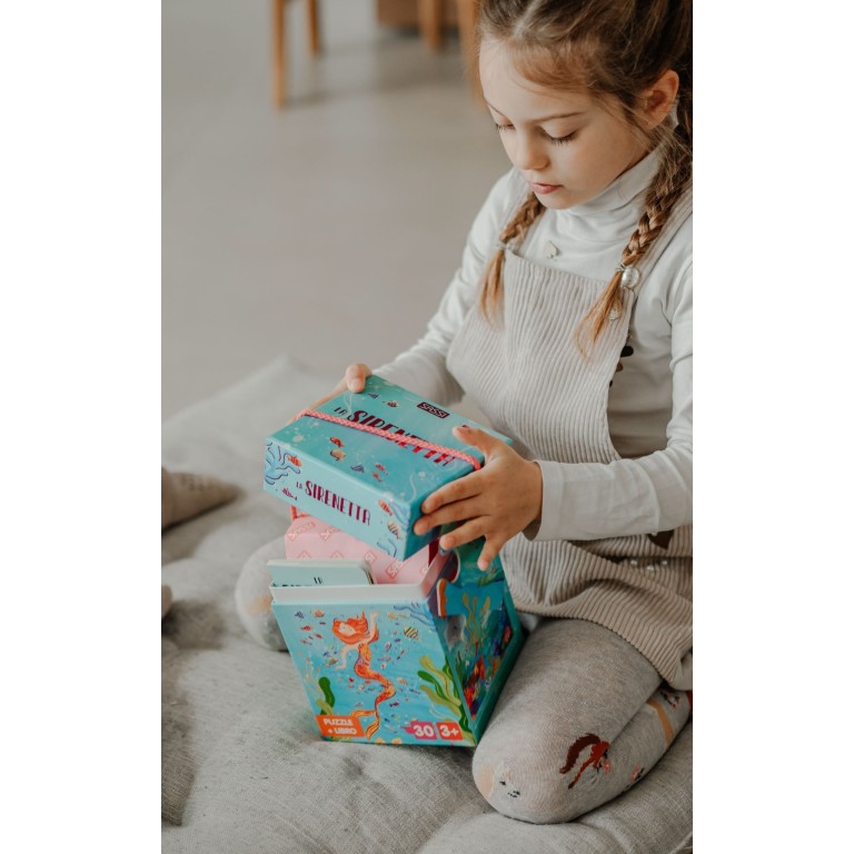 Puzzle et livre. La petite Sirène