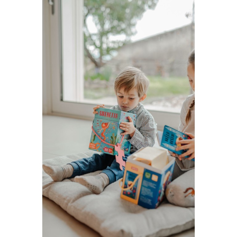 Puzzle et livre. La petite Sirène